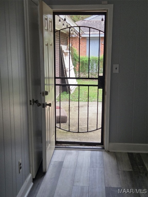 doorway featuring hardwood / wood-style floors