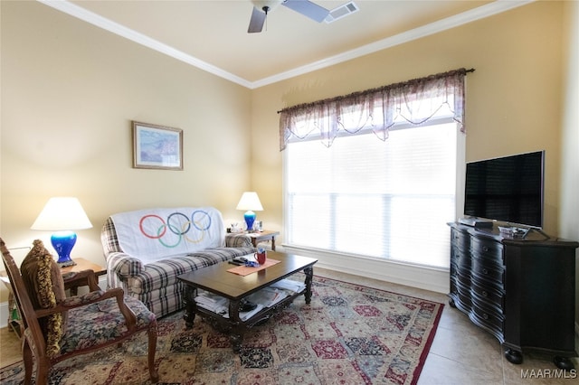 tiled living room featuring ornamental molding and ceiling fan