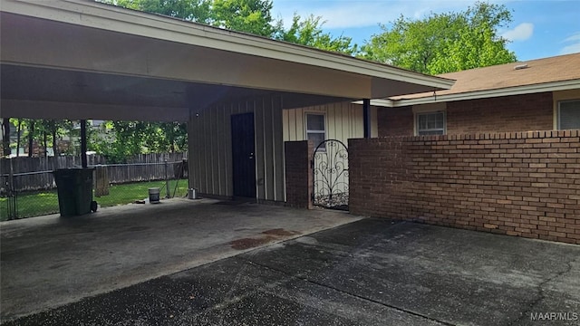 exterior space with a carport