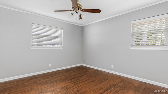 spare room featuring crown molding, dark hardwood / wood-style floors, and ceiling fan