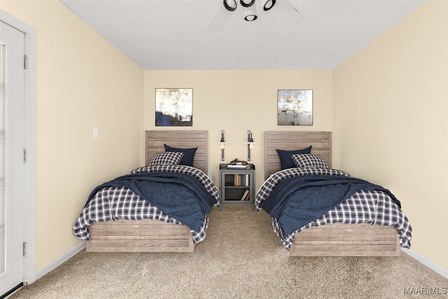 bedroom featuring ceiling fan and carpet floors