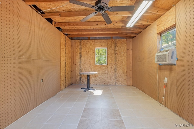 interior space featuring cooling unit and ceiling fan