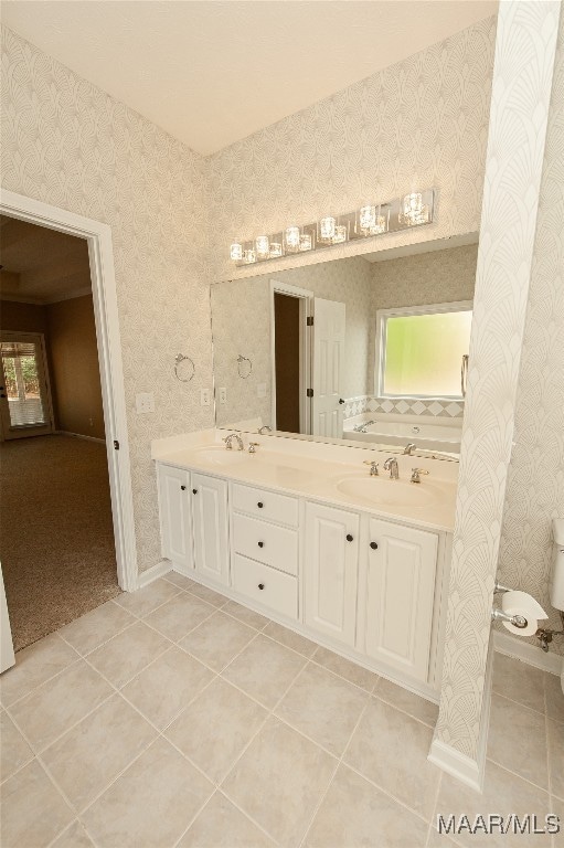 bathroom featuring vanity and tile patterned flooring