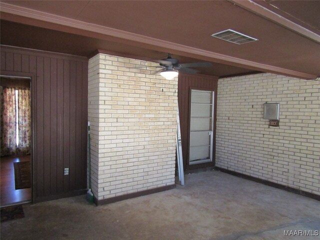 exterior space with ceiling fan