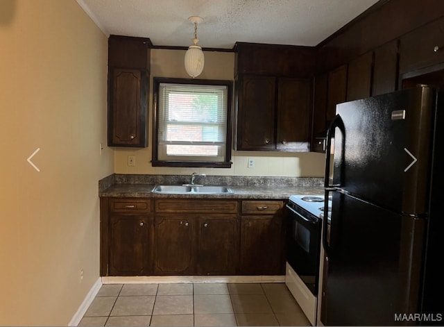 kitchen featuring dark brown cabinets, light tile patterned flooring, black refrigerator, electric stove, and sink