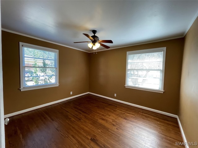 unfurnished room with dark wood-type flooring, a healthy amount of sunlight, and ceiling fan