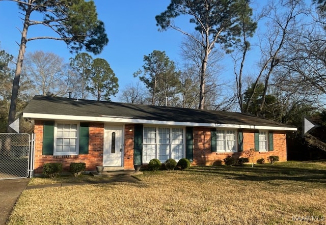 single story home with a front yard