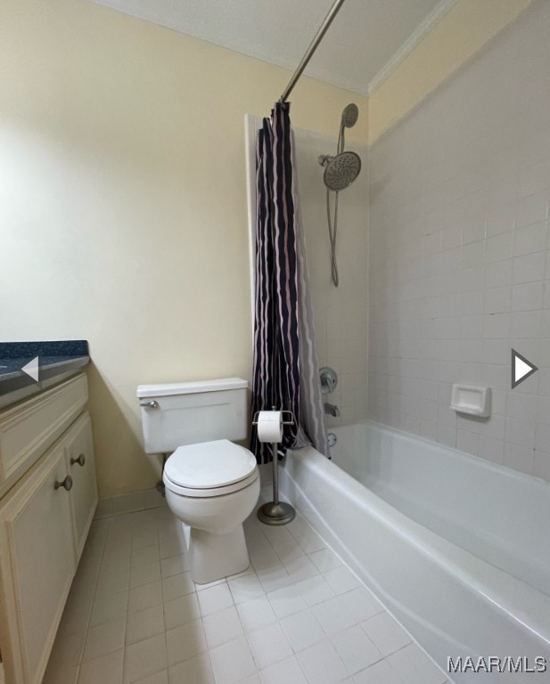 full bathroom with toilet, vanity, tile patterned floors, and shower / tub combo