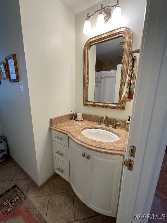 bathroom featuring vanity and tile patterned floors