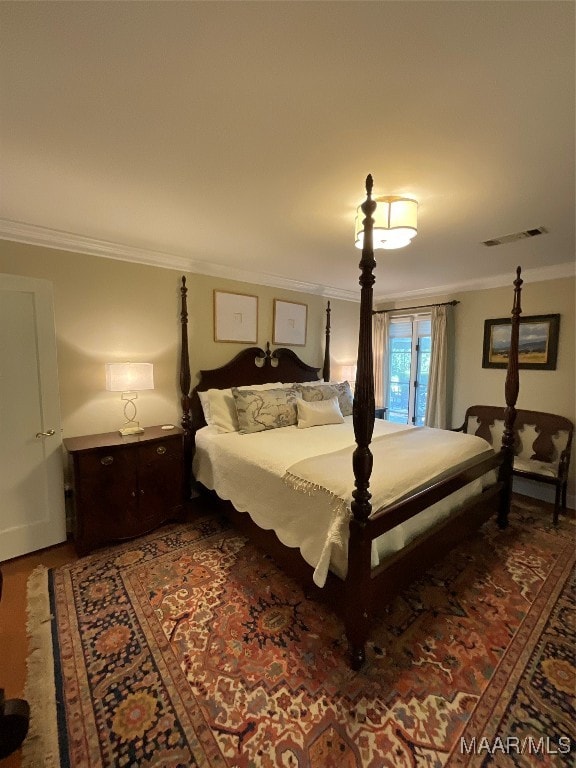 bedroom featuring ornamental molding