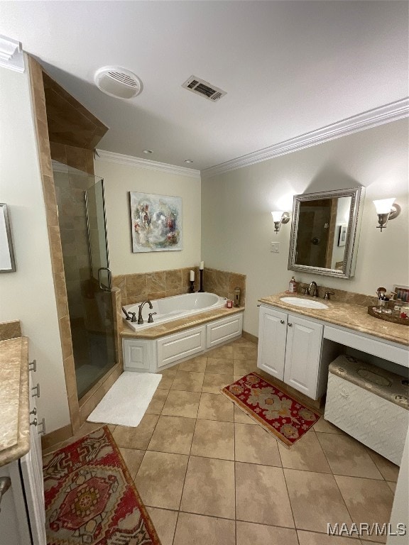 bathroom featuring vanity, independent shower and bath, ornamental molding, and tile patterned flooring