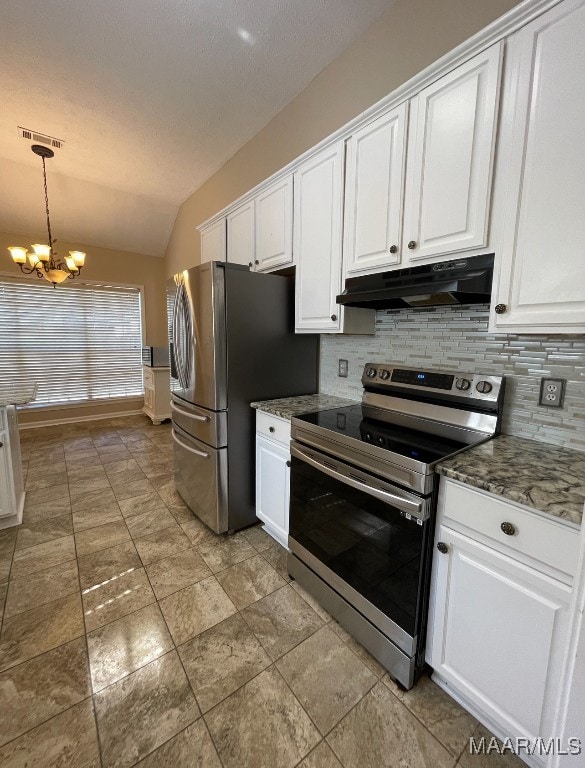 kitchen with lofted ceiling, a chandelier, white cabinets, and stainless steel appliances