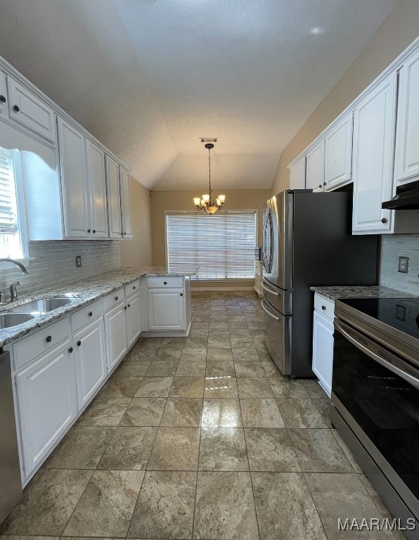 kitchen with lofted ceiling, decorative backsplash, sink, white cabinetry, and electric stove