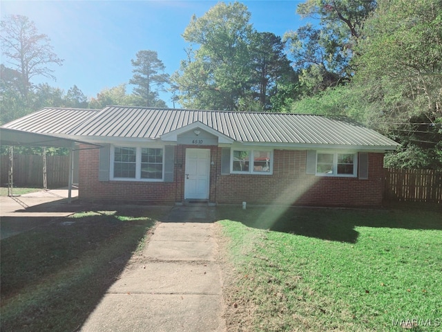 single story home featuring a front yard and a carport