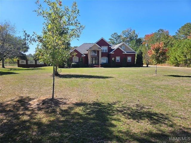 view of front of property with a front lawn