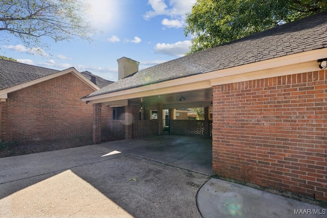 view of car parking with a carport