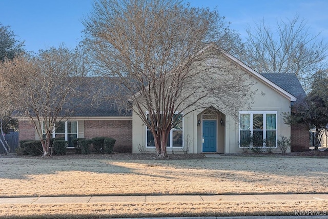 front facade with a front lawn