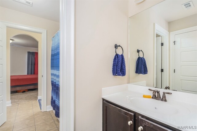 bathroom featuring vanity and tile patterned floors