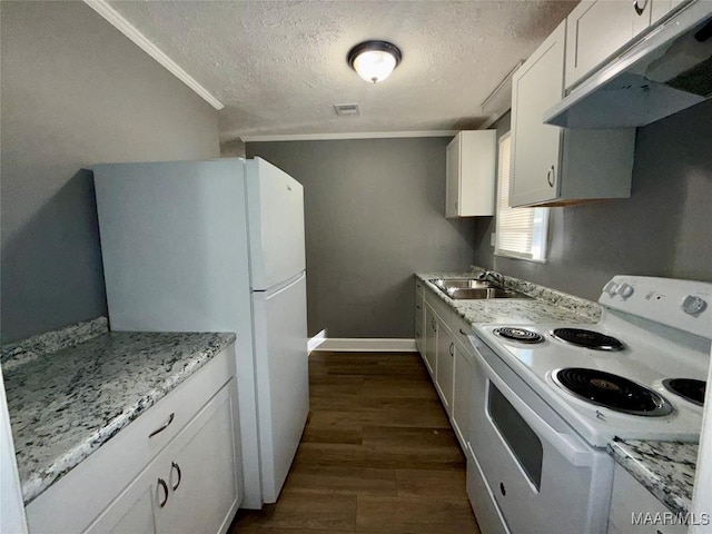 kitchen with sink, white cabinets, white appliances, dark wood-type flooring, and a textured ceiling