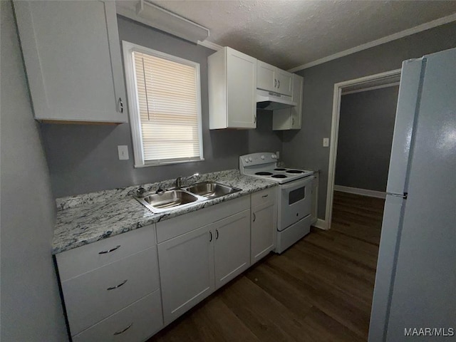 kitchen featuring dark wood-type flooring, sink, white cabinetry, a textured ceiling, and white appliances