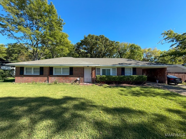 ranch-style house with a front lawn