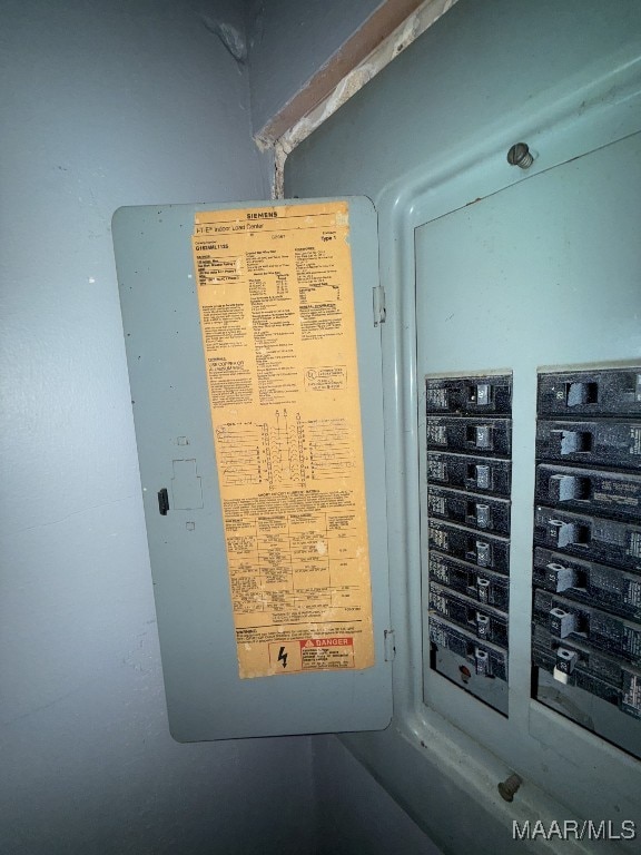 utility room featuring electric panel