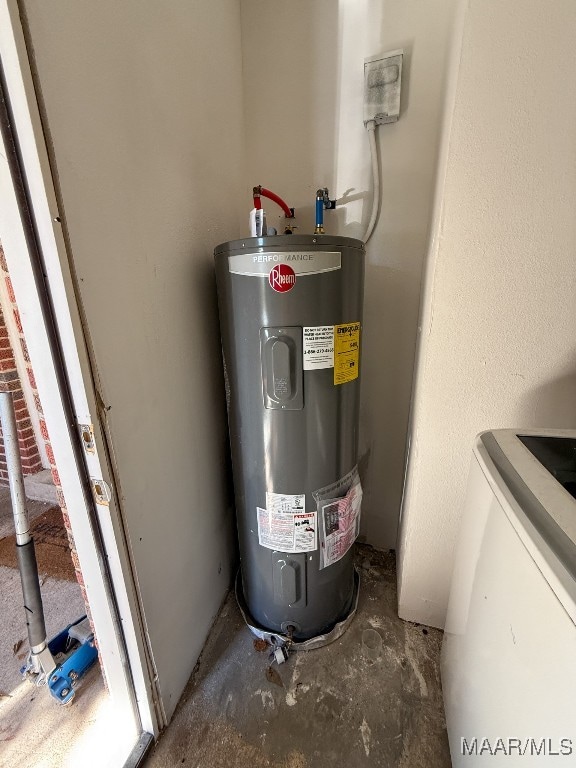 utility room featuring electric water heater