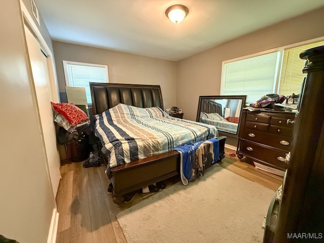 bedroom featuring hardwood / wood-style flooring