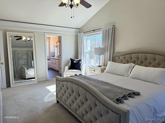 carpeted bedroom featuring connected bathroom, a ceiling fan, and high vaulted ceiling
