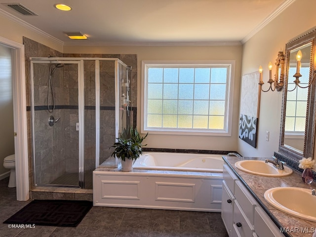 full bathroom featuring vanity, toilet, crown molding, and plus walk in shower