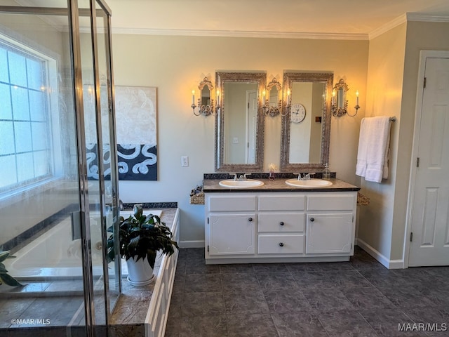 bathroom featuring vanity, tiled bath, a wealth of natural light, and ornamental molding