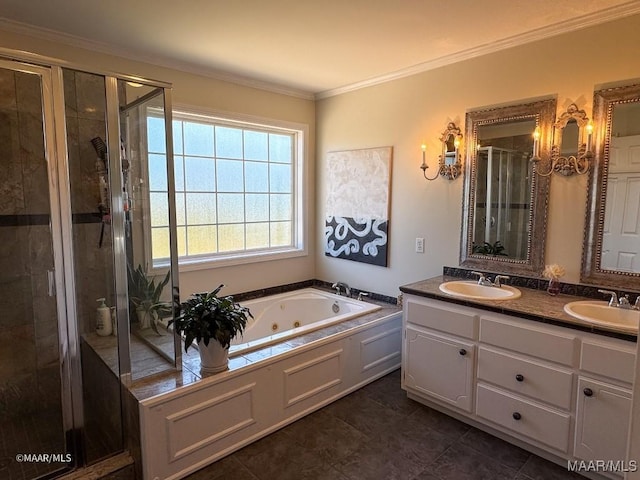 full bath with a whirlpool tub, a sink, a shower stall, and ornamental molding