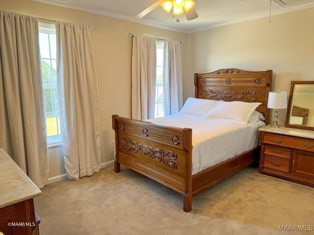 bedroom featuring multiple windows, attic access, ornamental molding, and light carpet