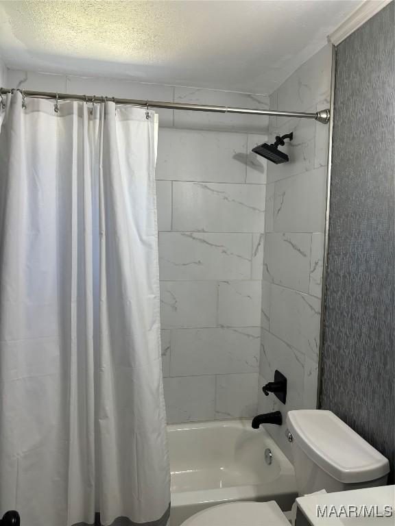 bathroom featuring shower / bath combination with curtain