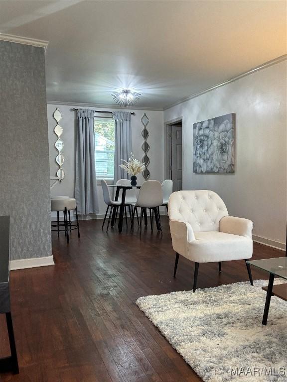 living room with crown molding and dark wood-type flooring