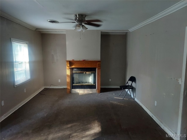 unfurnished living room featuring ornamental molding and ceiling fan