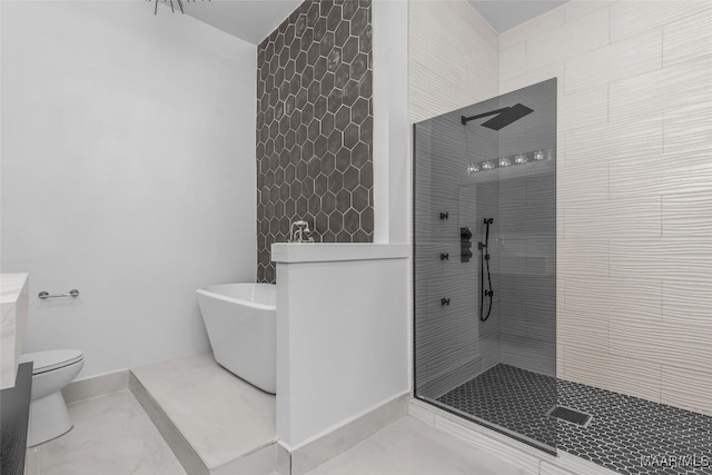 full bathroom with toilet, walk in shower, a freestanding tub, and baseboards