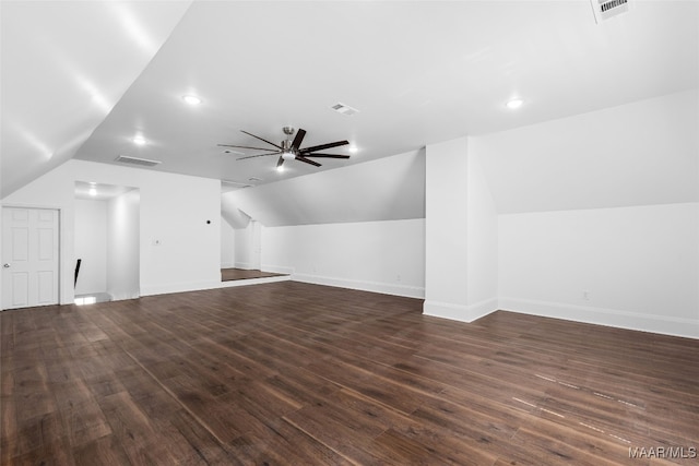 additional living space with lofted ceiling, ceiling fan, and dark hardwood / wood-style flooring