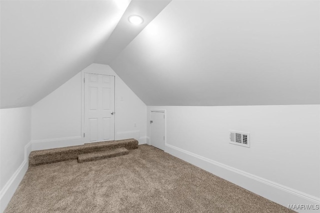 bonus room featuring recessed lighting, vaulted ceiling, visible vents, baseboards, and carpet flooring