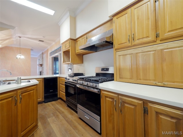 kitchen with exhaust hood, stainless steel gas range, ornamental molding, pendant lighting, and light hardwood / wood-style floors