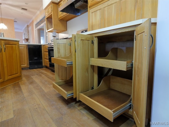 kitchen with hanging light fixtures, light brown cabinetry, light wood-type flooring, crown molding, and ventilation hood