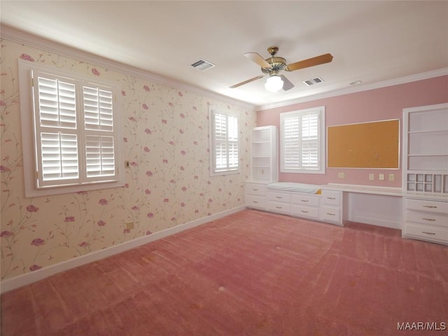 unfurnished room featuring a ceiling fan, crown molding, visible vents, and light colored carpet