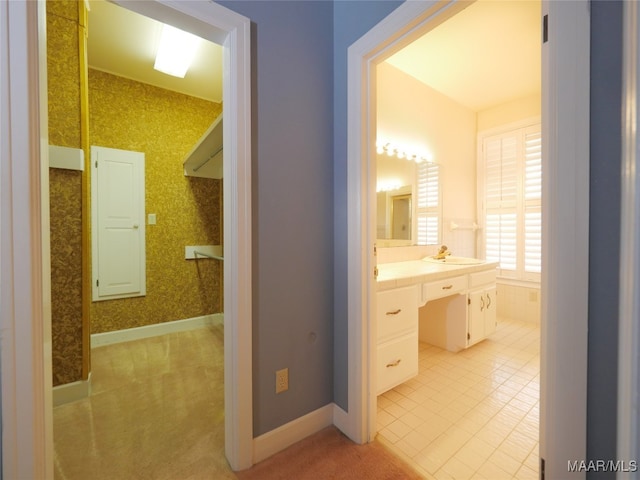 bathroom with vanity and tile patterned floors