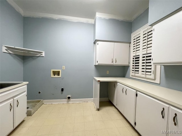 laundry room featuring light floors, baseboards, washer hookup, cabinet space, and electric dryer hookup