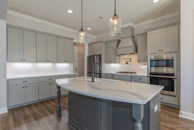 kitchen featuring light stone counters, appliances with stainless steel finishes, dark hardwood / wood-style flooring, and a kitchen bar