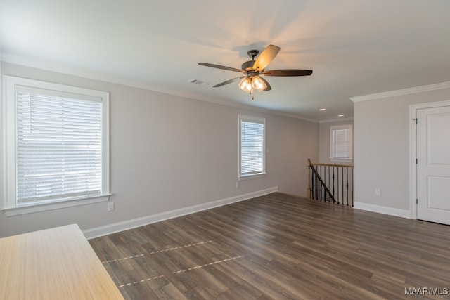 unfurnished room with crown molding, dark hardwood / wood-style flooring, and ceiling fan