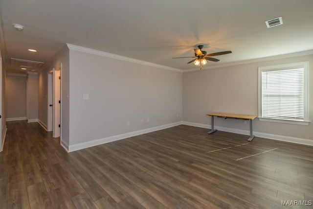 unfurnished room featuring ceiling fan, crown molding, and dark hardwood / wood-style floors