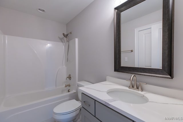 full bathroom featuring vanity, shower / washtub combination, and toilet