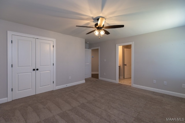 unfurnished bedroom featuring a closet, carpet, and ceiling fan