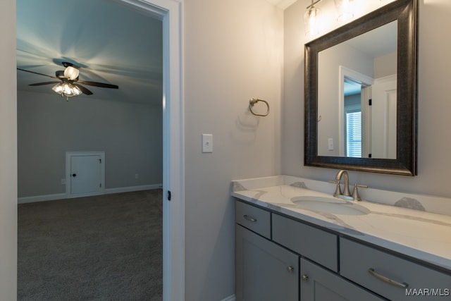 bathroom featuring vanity and ceiling fan